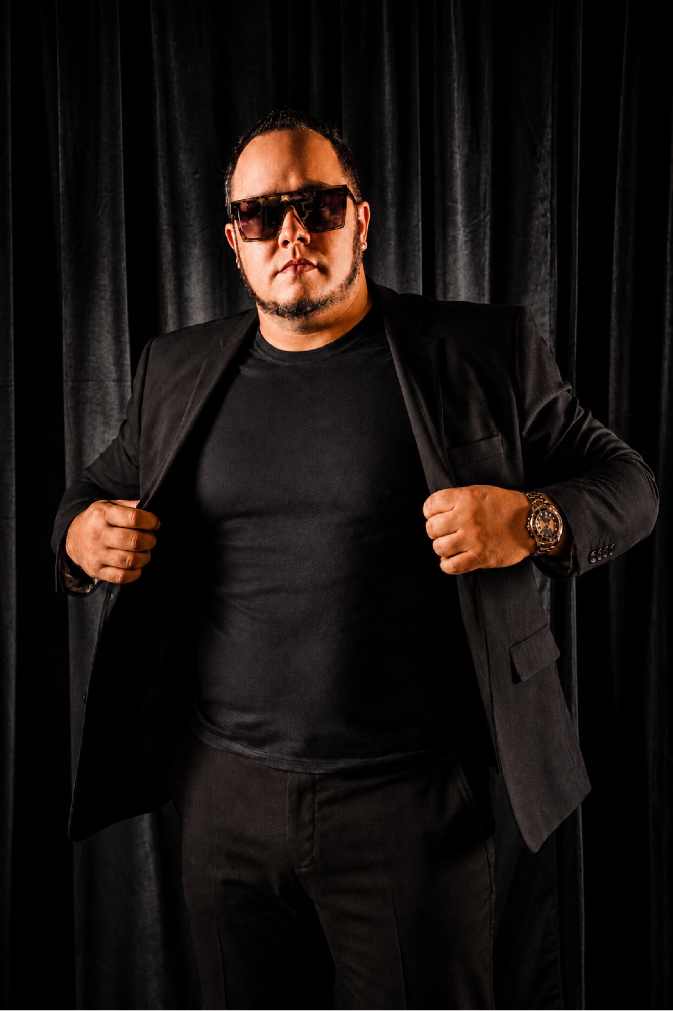 Emad Alayoubi portrait in black suit and sunglasses